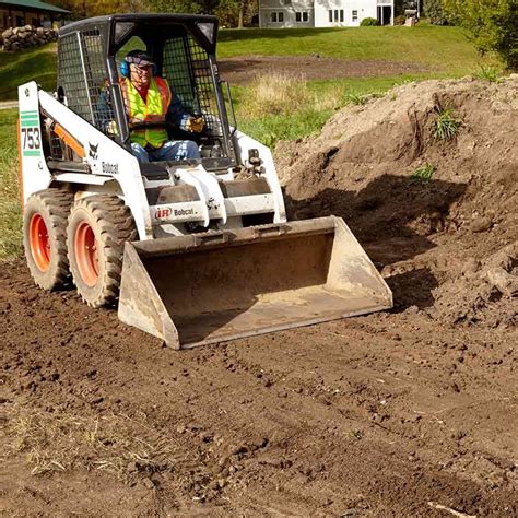 skid steer warming up with forks|how to keep skid steer warm.